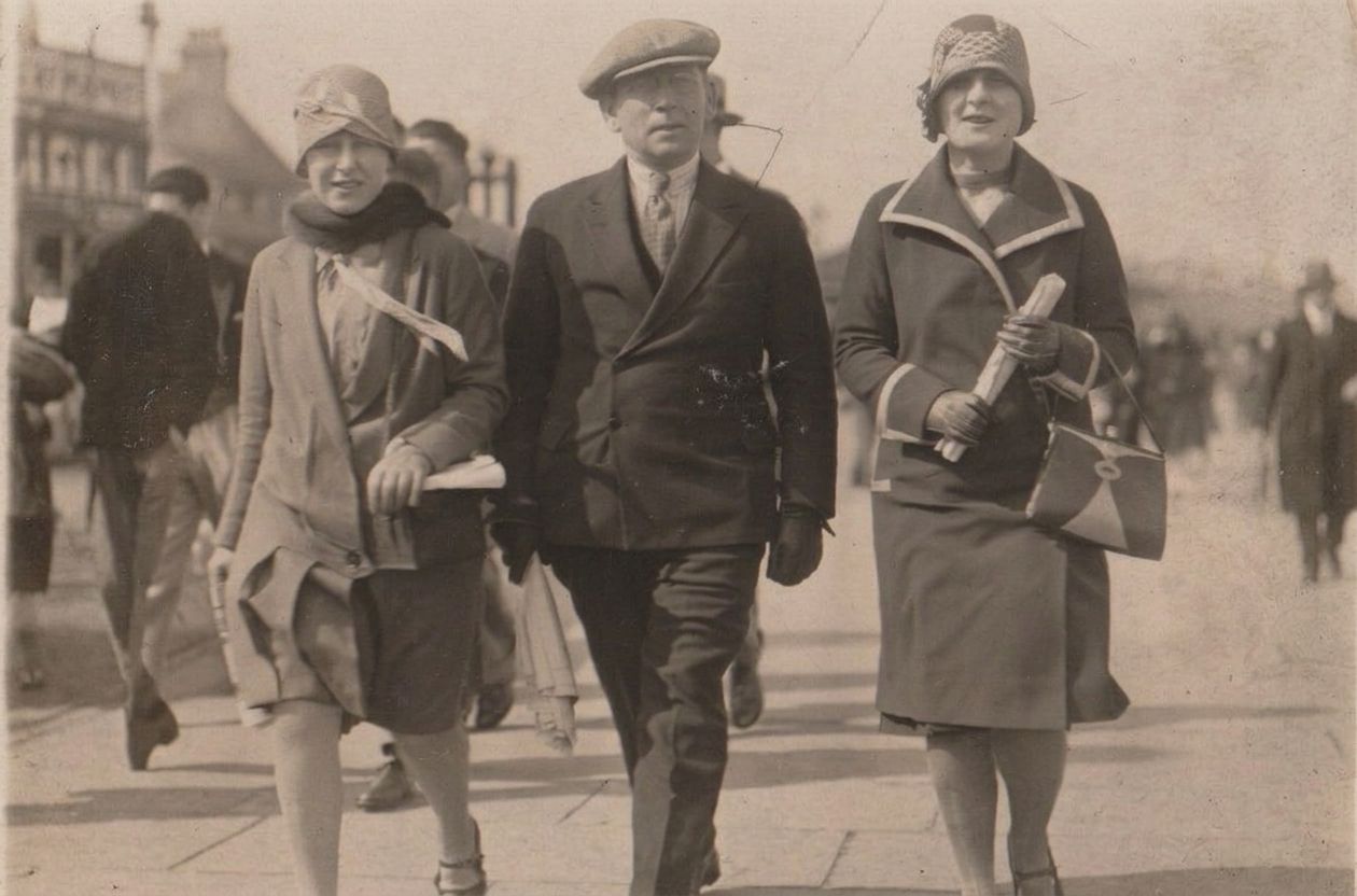 Sam walking along the seafront promenade at Margate with his daughters Gladys and Beatrice.